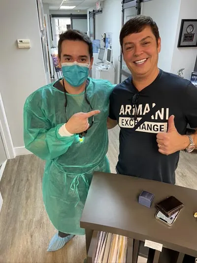 Dr. Oliveira with one of his patients at Lake Lucerne Lifestyle Dentistry in Orlando, FL