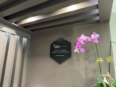 plaque showing Lake Lucerne Lifestyle Dentistry hanging in their front office at their Orlando location