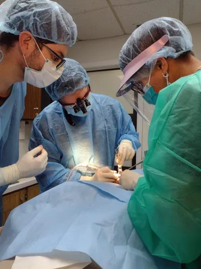 the Lake Lucerne Lifestyle Dentistry team providing dental care for a patient at their office in Orlando, FL