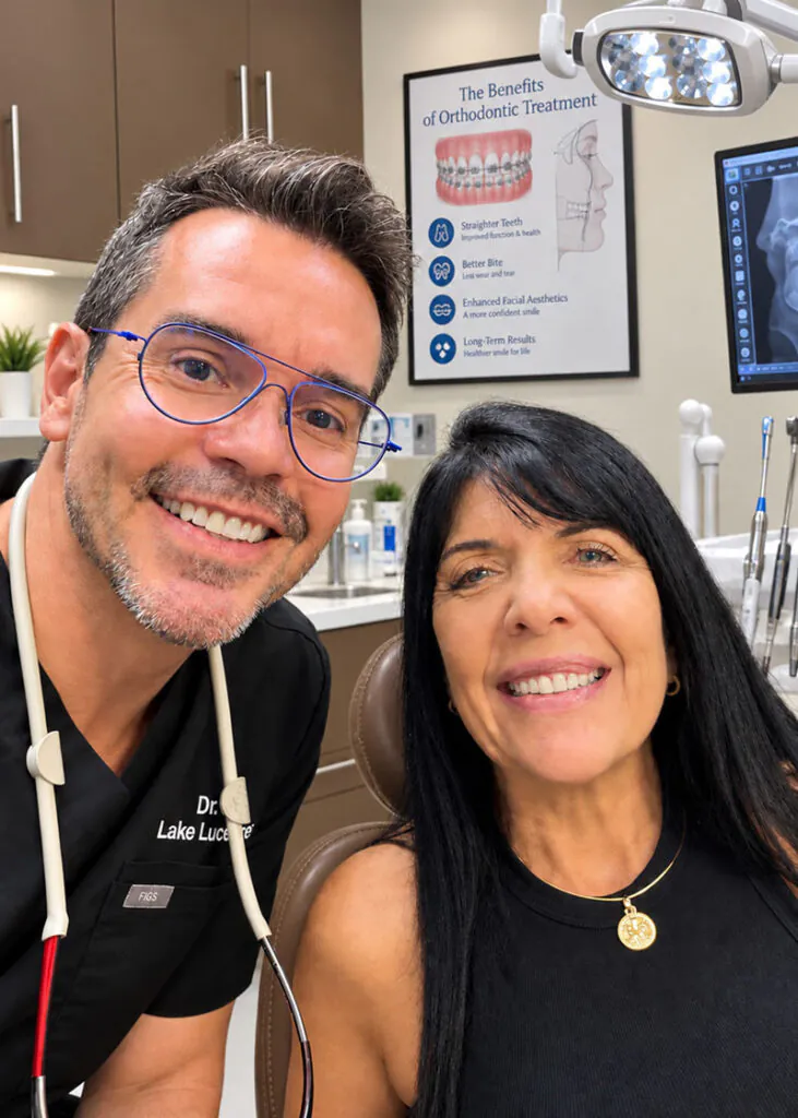 Dr. Oliveira with a patient at Lake Lucerne Cosmetic & Implant Dentistry