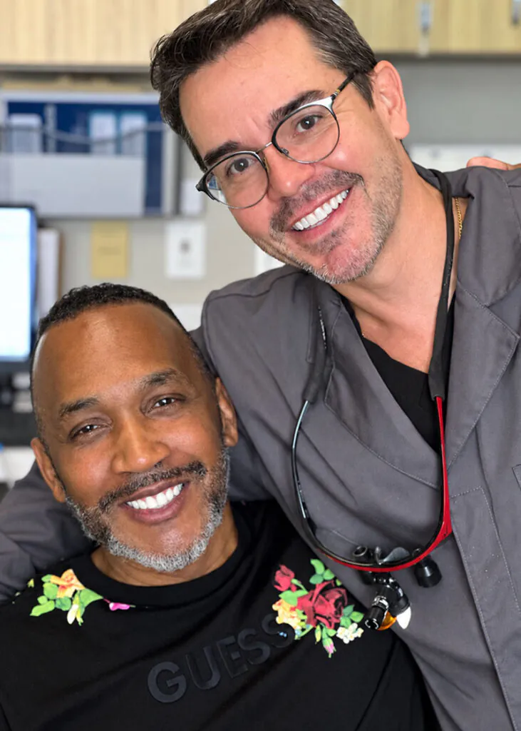 Dr. Oliveira with a patient at Lake Lucerne Cosmetic and Implant Dentistry