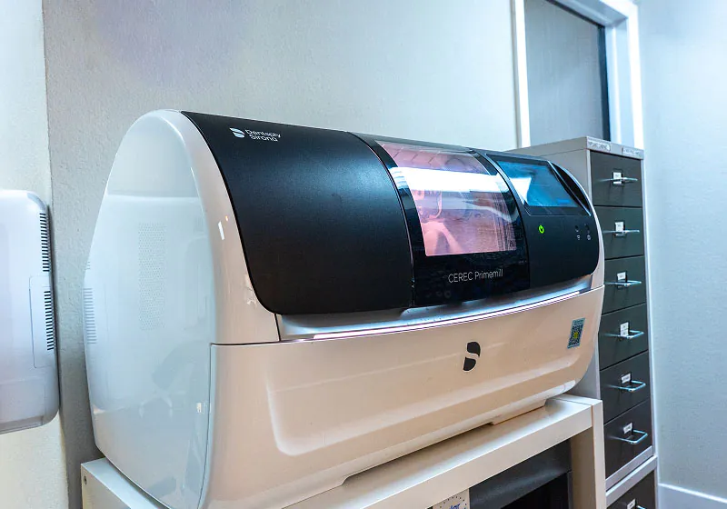 CEREC machine used to craft restorations at Lake Lucerne Cosmetic and Implant Dentistry