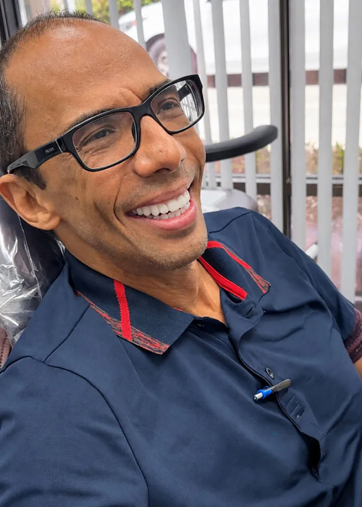 restorative dentistry patient smiling at Lake Lucerne Cosmetic and Implant Dentistry